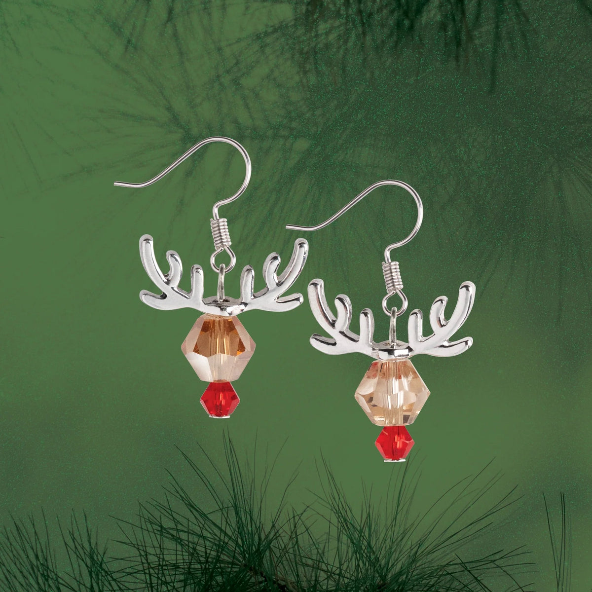 Solid Oak Nostalgic Christmas kit featuring Beaded reindeer earrings, green background