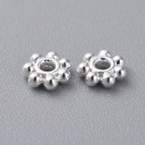 Metal Flower Spacers 4mm Silver 100/pk