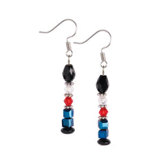 Close-up of the Toy Soldier earring pair with silver hooks and red and blue bead details