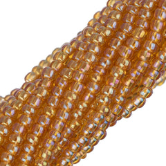 11/0 Czech Seed Beads #34944 Transparent Topaz AB 12 Strand Hank