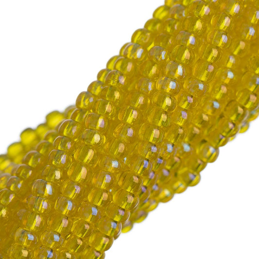11/0 Czech Seed Beads #34948 Transparent Yellow AB 12 Strand Hank