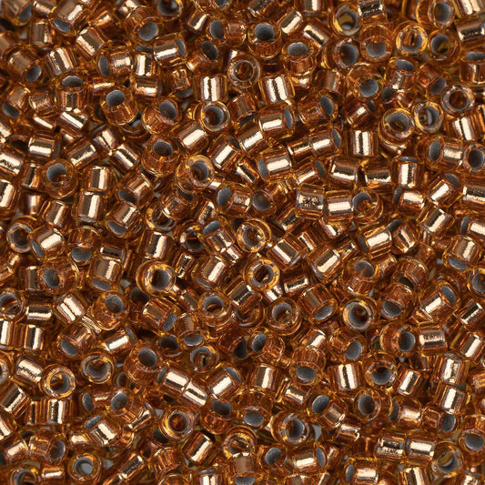 11/0 Delica Bead #0181 Tr Light Bronze 5.2g