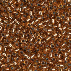 11/0 Delica Bead #0181 Tr Light Bronze 5.2g